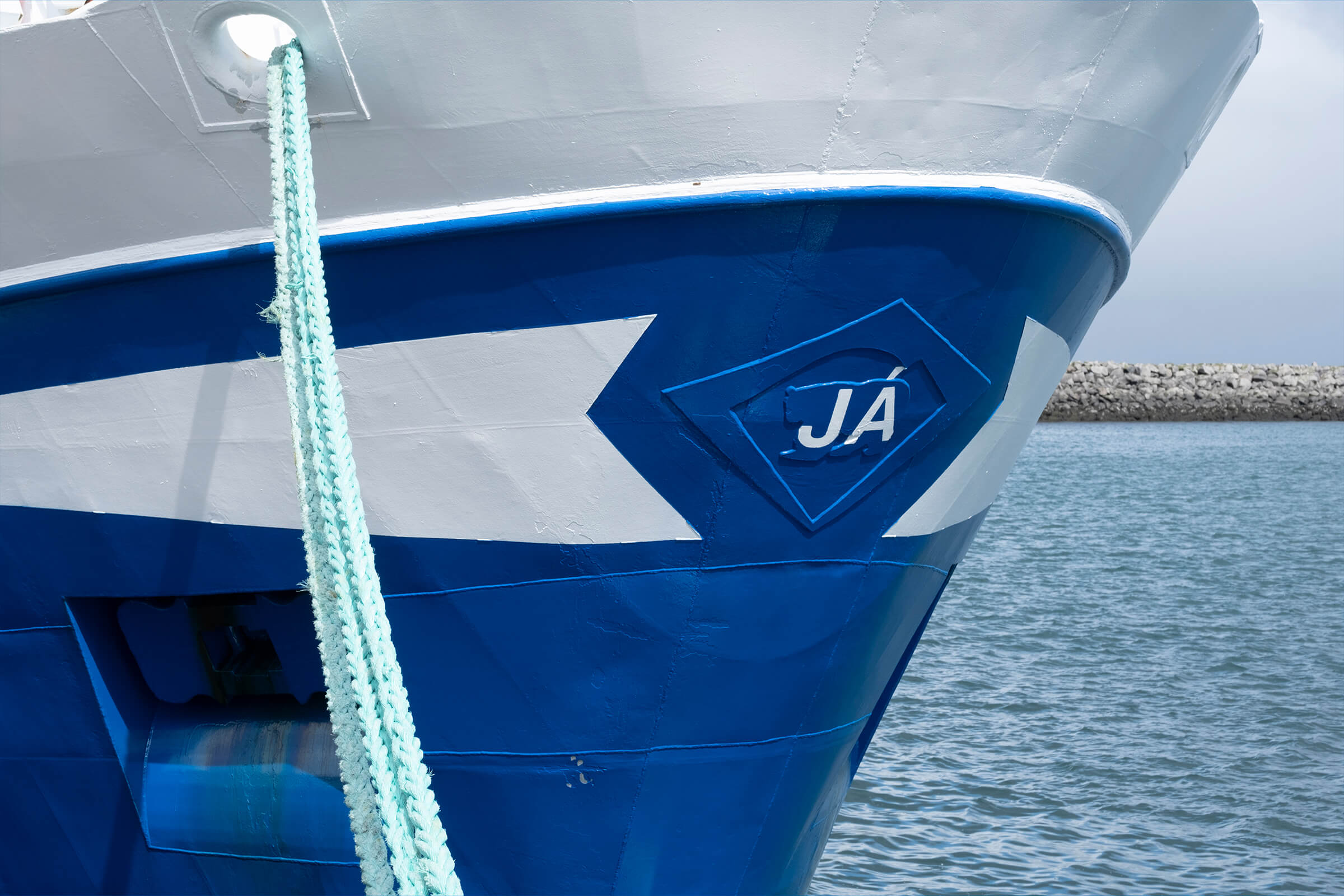 The cover draws inspiration from the embossed markings on ships